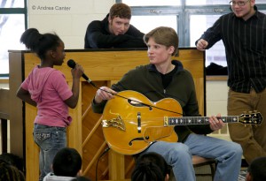 Returning alum Geoff LeCrone (guitar) on a school visit in 2008, © Andrea Canter